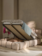Cama tapizada Tayla de bouclé con espacio de almacenaje