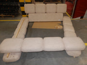 Cama tapizada Tayla de bouclé con espacio de almacenaje